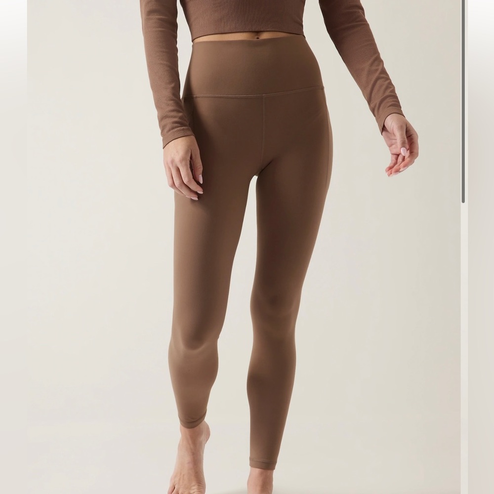 Athleta Salutation Stash Tight Sz S color Rustic Beige like new!